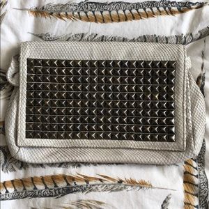 Tyler Malibu snakeskin look clutch with studs